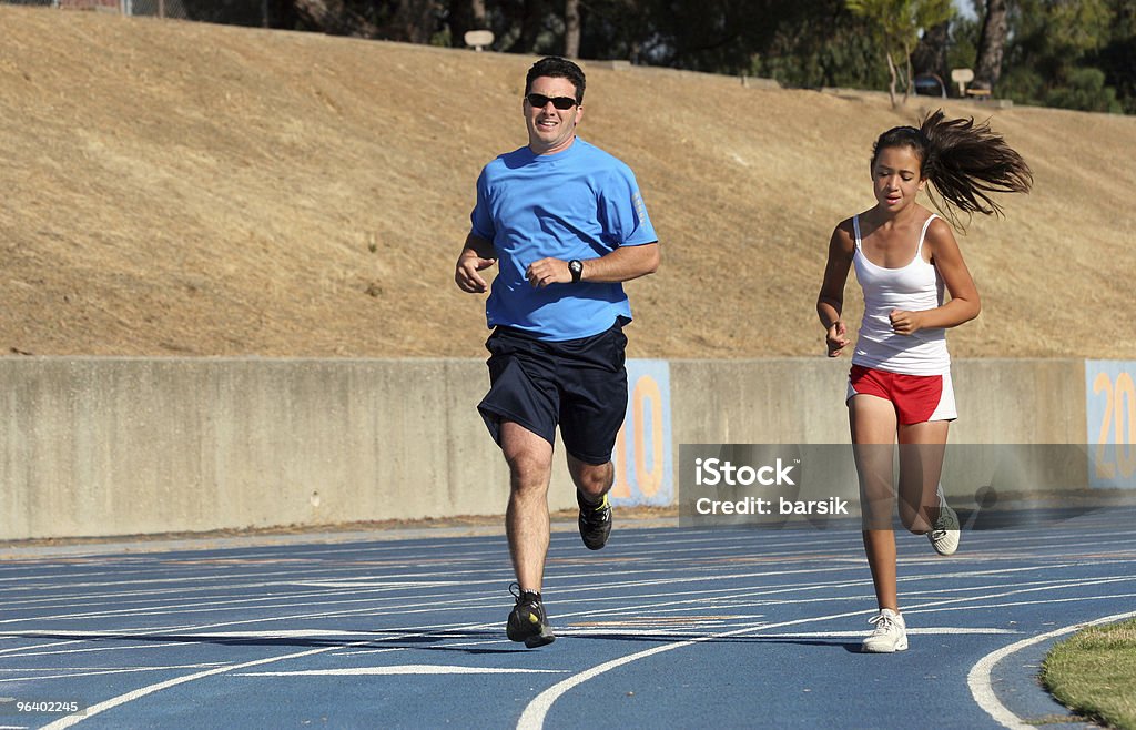 Father and daughter running  Father Stock Photo