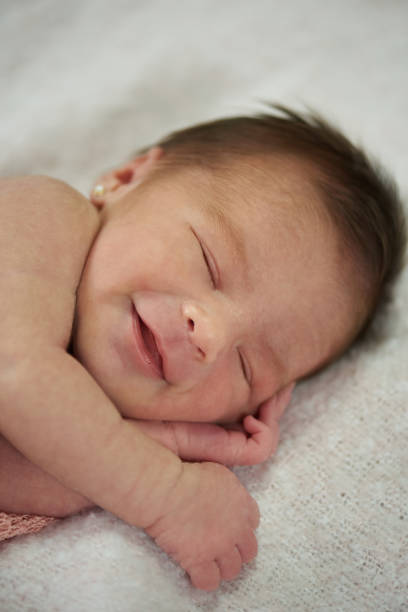 istock Happy smiling sleepy baby 964026378
