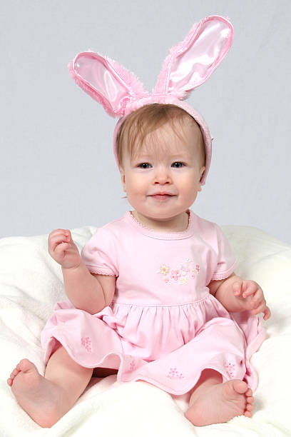istock Baby Girl With Rabbit Ears 96402828