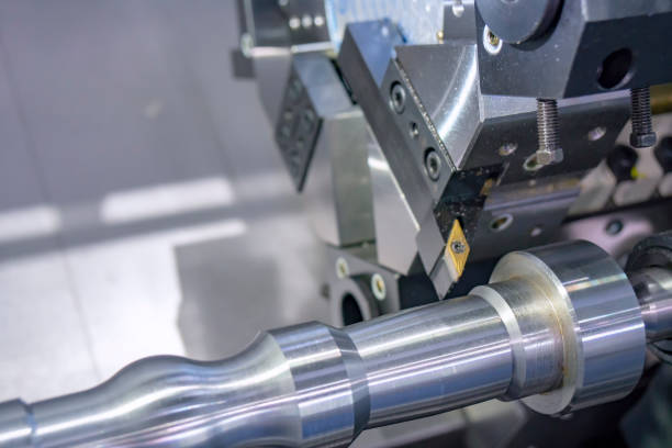 istock The CNC lathe machine or turning machine cutting the aluminum rod . 964028682