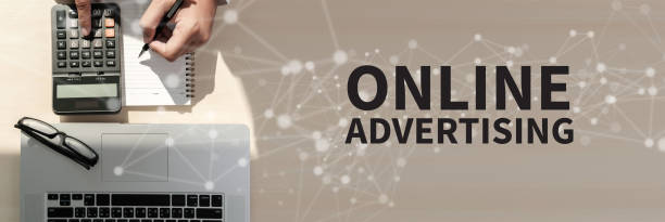 istock ONLINE ADVERTISING Business team work with financial reports banner with copy space 964034114