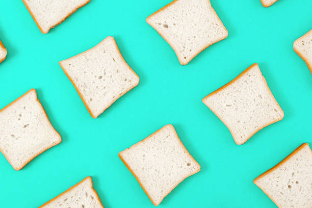 istock Set toasts bread on blue background top view, flat lay, top view 964047886