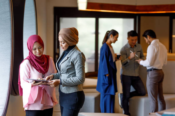 istock Two Creative Muslim Women Discussing Ideas 964050424