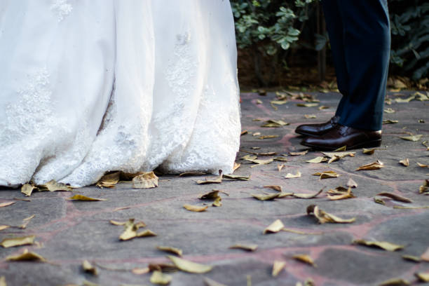 istock Groom and bride shoes 964055978