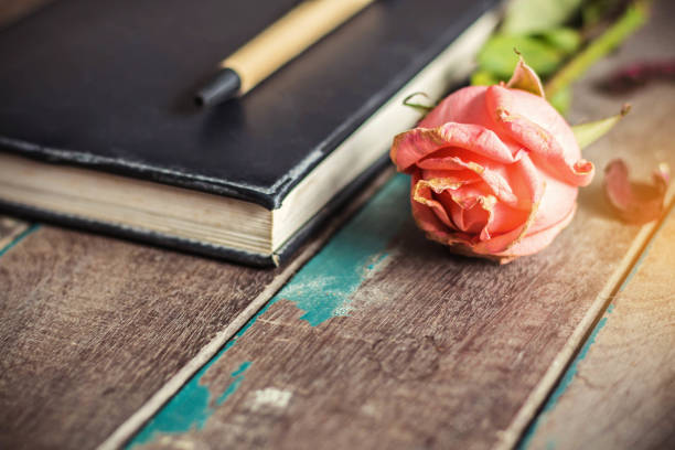 istock Dry rose on the wooden. 964067628
