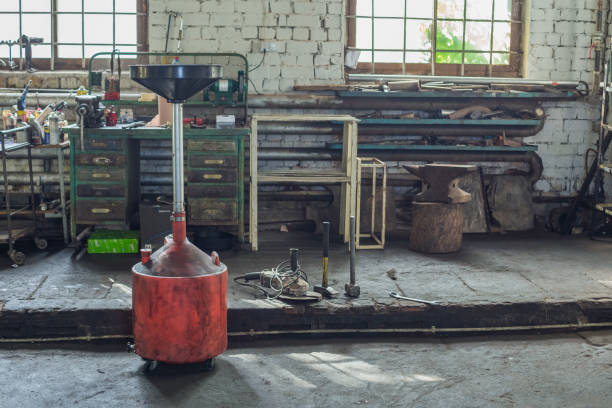 istock Car repair service, tools, oil an dirty place. 964068052