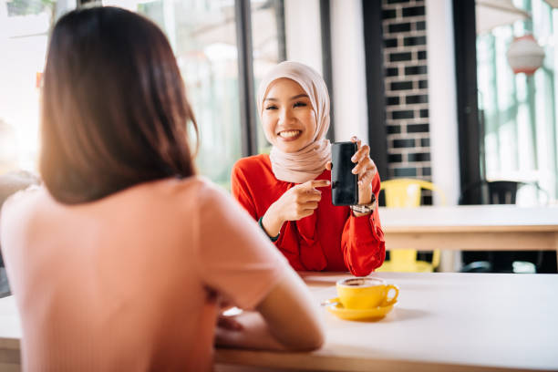 istock Coffee break and gossip with best friends 964070672