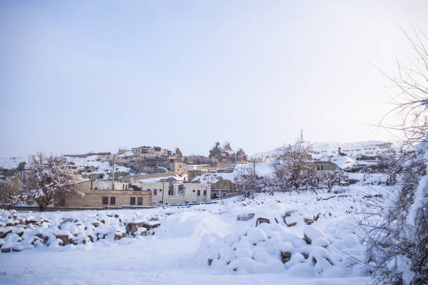 istock snow landscape and snowdrift on building and trees in parks 964076860