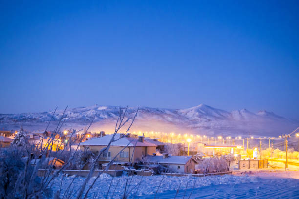 istock snow landscape and snowdrift on building and trees in parks 964076944