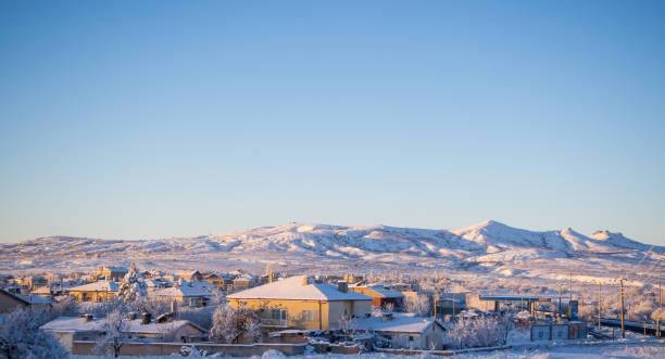 istock snow landscape and snowdrift on building and trees in parks 964076982