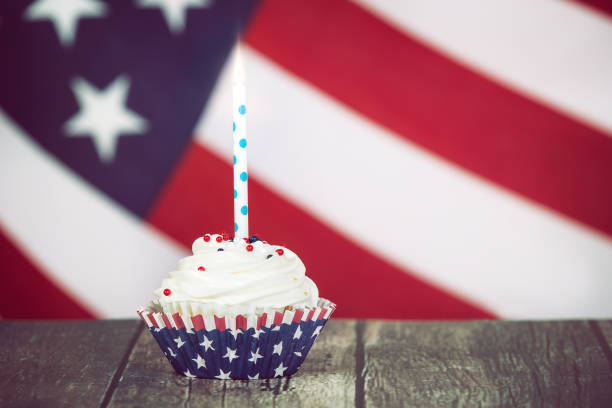 Patriotic 4th of July celebration cupcake with a candle