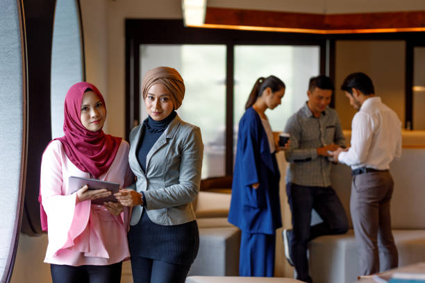 istock Two Creative Muslim Women Discussing Ideas 964079718