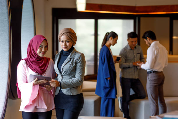 istock Two Creative Muslim Women Discussing Ideas 964079730