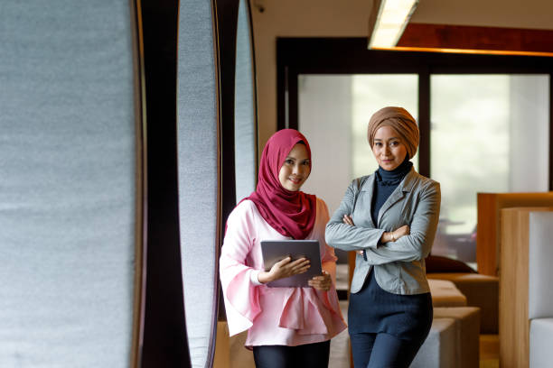 istock Two Creative Muslim Women Discussing Ideas 964079776