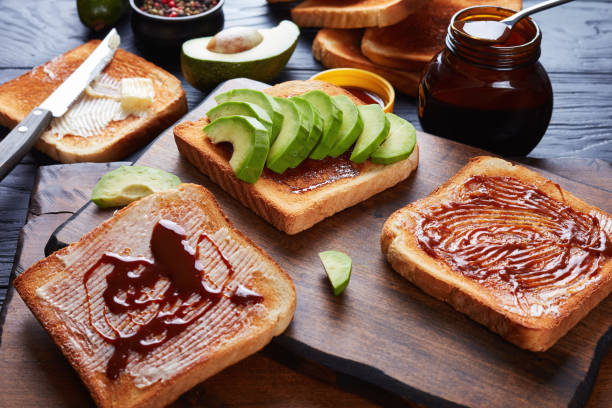 istock salty toasts with butter, avocado, yeast spread 964085244
