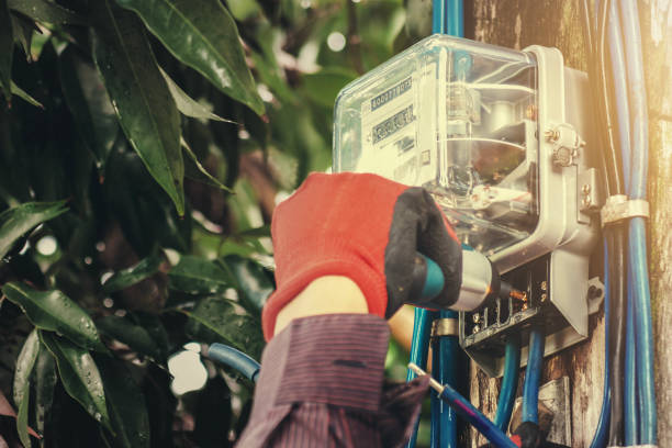istock electrician installing watthour meter at home 964090806