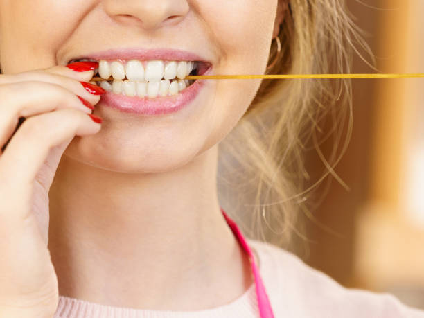 istock Woman holding long pasta 964094812