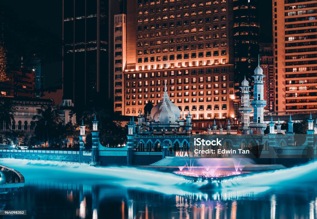 Jamek mosque in the heart of Kuala Lumpur in Malaysia at night in front of river of life Newly Industrialized Country Stock Photo