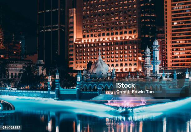 Jamek Mosque In The Heart Of Kuala Lumpur In Malaysia At Night In Front Of River Of Life Stock Photo - Download Image Now
