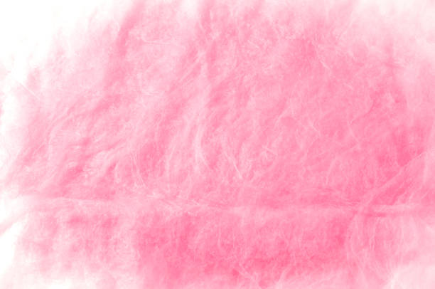 istock Texture background of fabric. Cotton pink fabric. Text space. Rose-colored fabric texture in close-up.  trend color rose quartz pink pastel tone - close up of elegant textile background 964112510