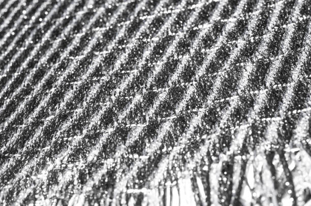 istock Texture, background, pattern. Women's scarf, striped fabric Black white lines intertwined 964115138