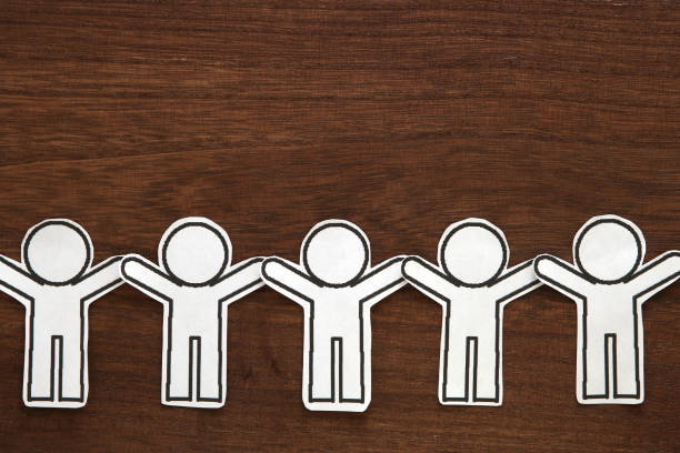 istock Human paper cut illustration vector on brown wood.  Teamwork concept. Social Network concept. 964115208