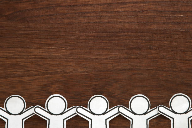 istock Human paper cut illustration vector on brown wood.  Teamwork concept. Social Network concept. 964115226