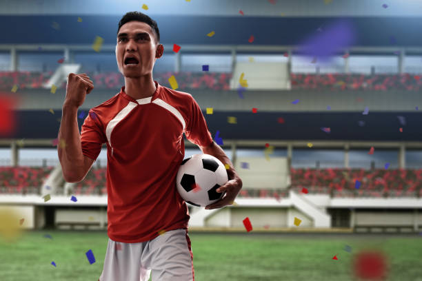 istock Asian soccer player celebrating 964116082