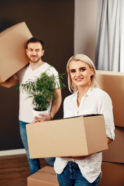istock Happy Couple Moving In New Home 964116106