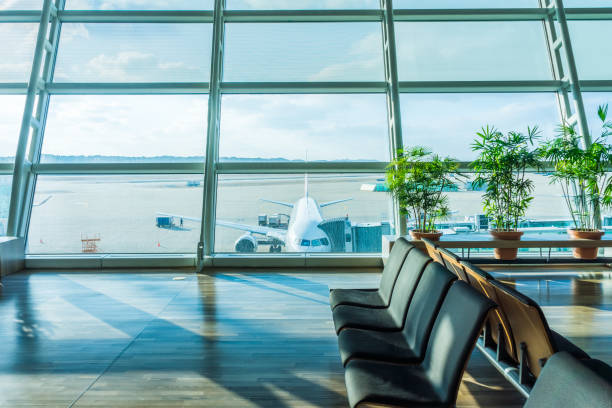istock Waiting area of concourse in airport. 964119968
