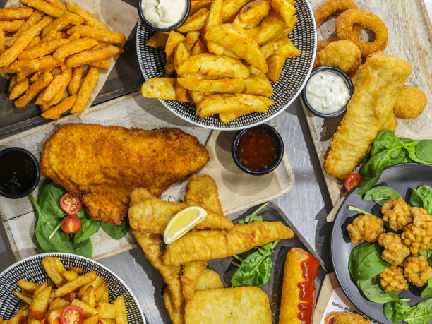 istock Overhead view of deep fried food presented on a table 964122816