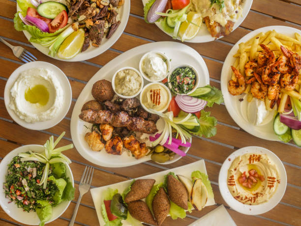 istock Overhead view of middle-eastern style banquet dishes 964123592