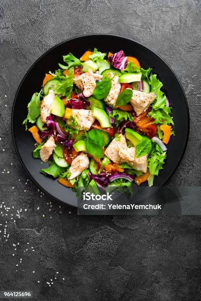 Salad With Fish Fresh Vegetable Salad With Salmon Fish Fillet Fish Salad With Salmon Fillet And Fresh Vegetables On Plate Stock Photo - Download Image Now