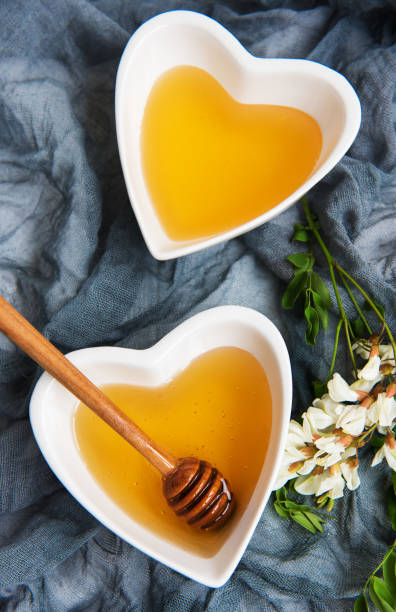 istock Honey with acacia blossoms 964125820