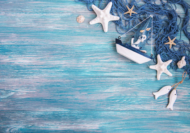 istock Fishing net with starfish and sea decorations 964125906