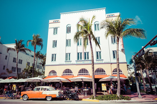 MIAMI BEACH, FLORIDA, USA - FEBRUARY 18, 2018: Vintage Car Parked along Ocean Drive in the Famous Art Deco District in South Beach. South Beach, FL