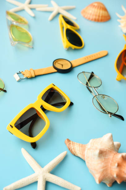 istock Modern fashionable sunglasses and sandals with starfish 964126880
