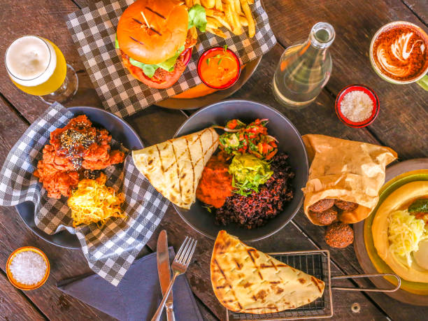 istock Overhead view of pub-style food on a timber tabletop 964129058