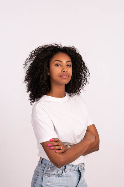 istock Simple woman standing with folded arms. 964129194