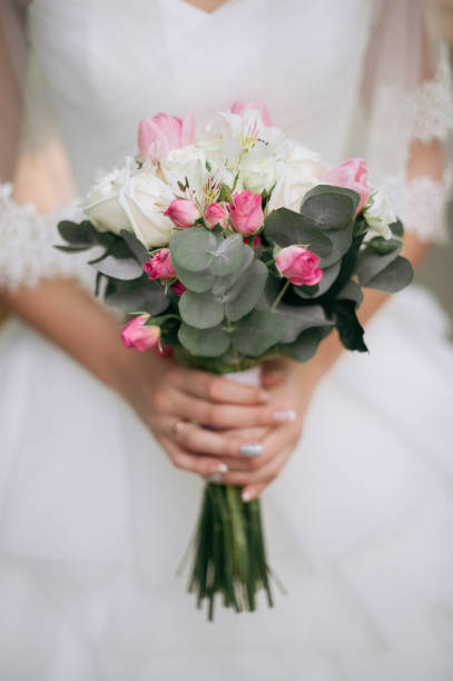 istock Bride boho style. Those girls are not seen are only visible hand 964129588