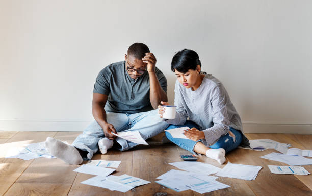 istock Couple managing the debt 964129720