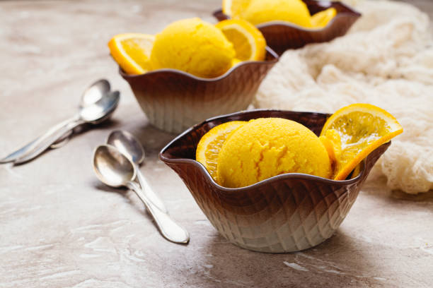 istock Orange ice cream. Summer orange sorbet 964132962