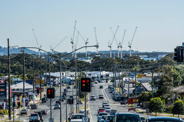 Building a hospital with cranes Building a hospital with cranes with busy roads in the foreground caloundra stock pictures, royalty-free photos & images
