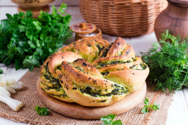 istock Garlic bread rolls with garlic, dill and herbs 964135854