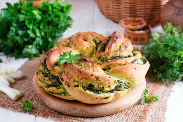 istock Garlic bread rolls with garlic, dill and herbs 964135856