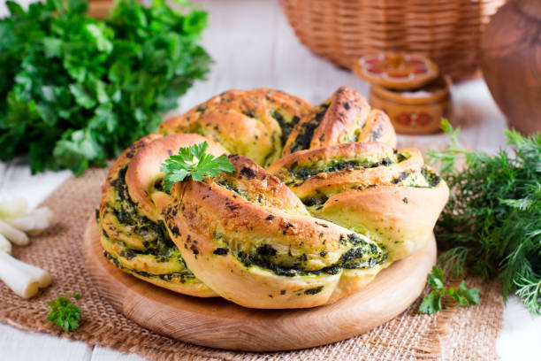 istock Garlic bread rolls with garlic, dill and herbs 964135880