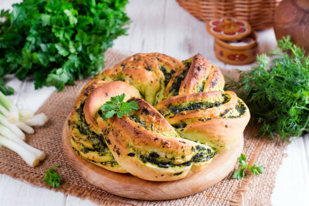 istock Garlic bread rolls with garlic, dill and herbs 964135882