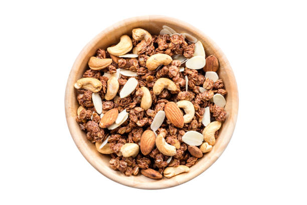 istock Close up top view granola in the bowl on isolated with clipping path. 964136518