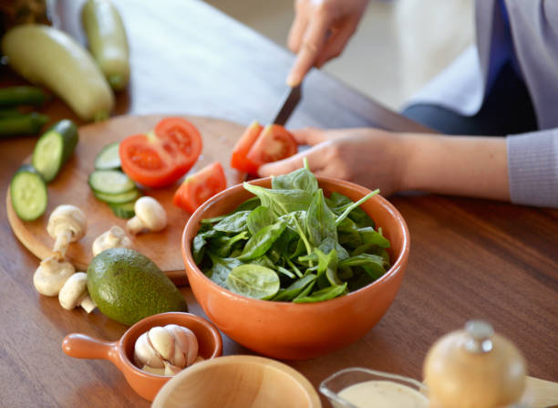 istock woman cooking in the kitchen 964137002