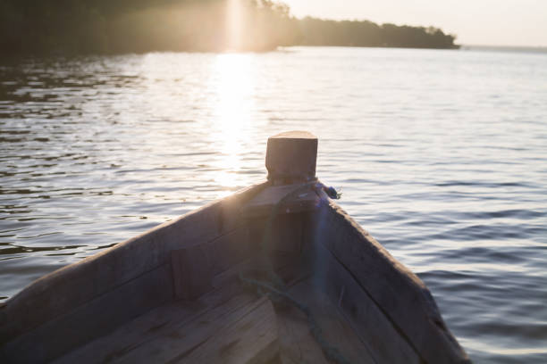 istock sunset by canoe over the ocean 964139034